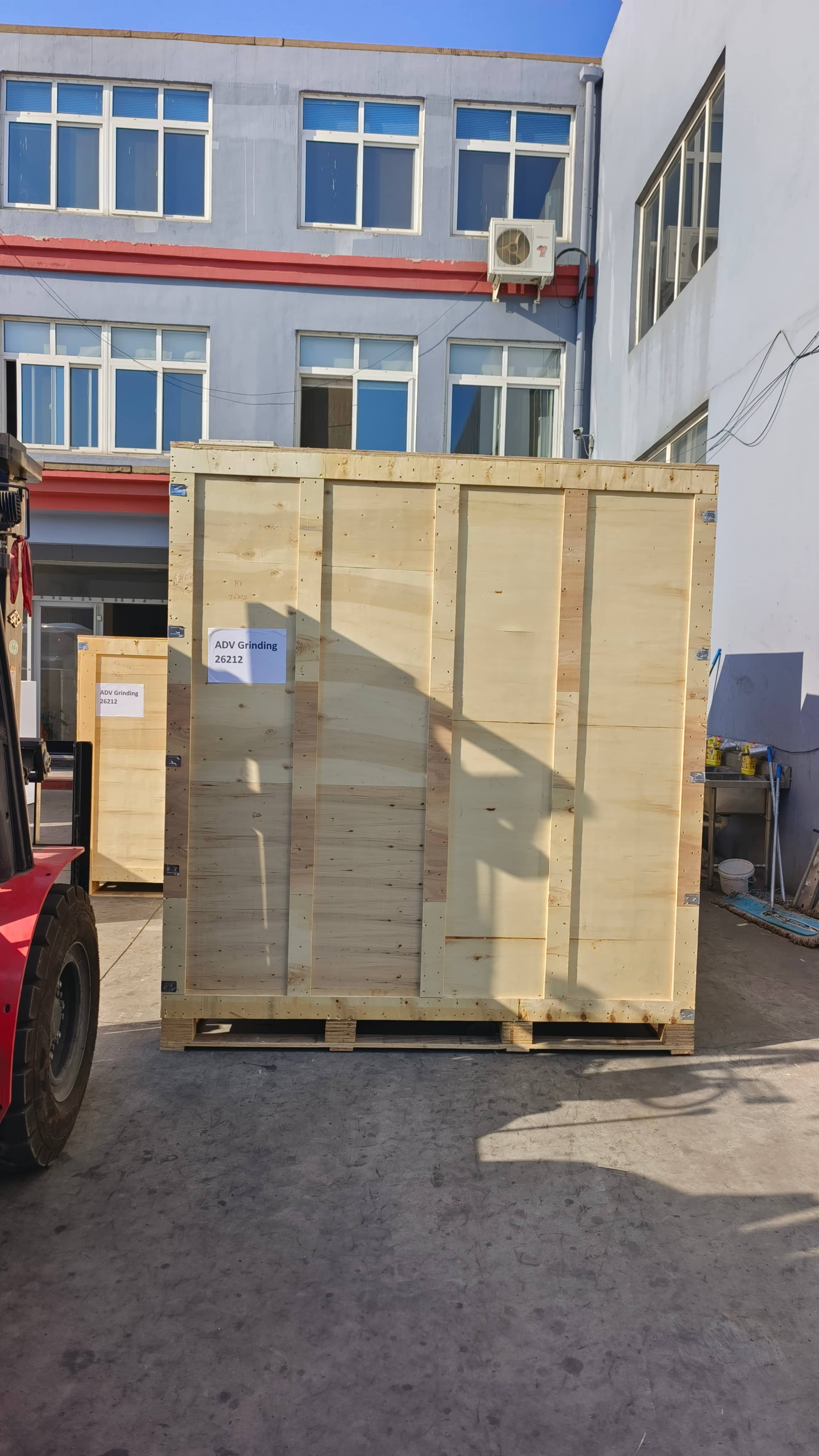 Deburring and polishing machines packed in wooden crates for shipment to Australia