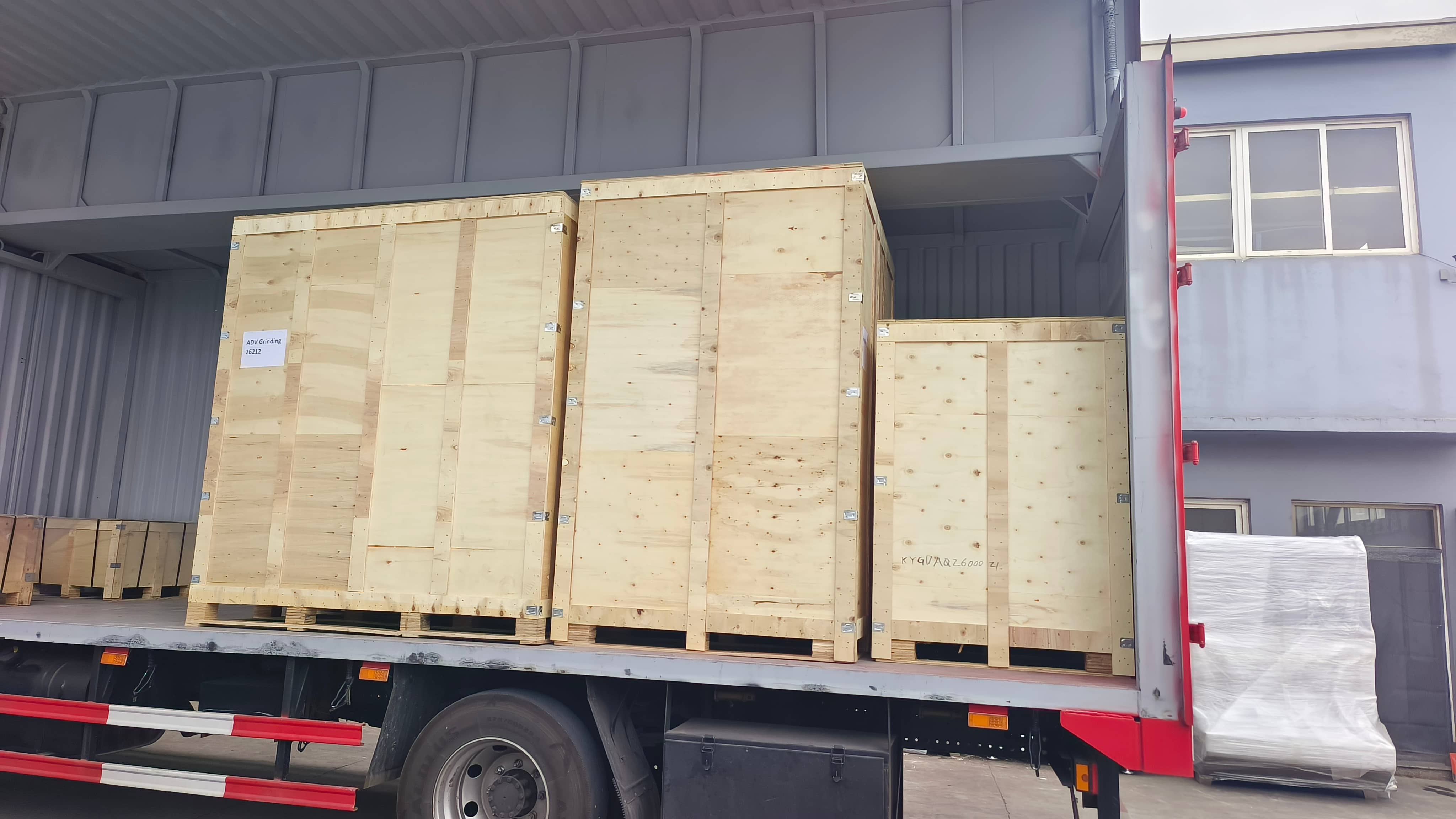 Wooden crates loaded onto truck for export to Australia
