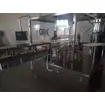Automatic spout pouch filling and capping machine